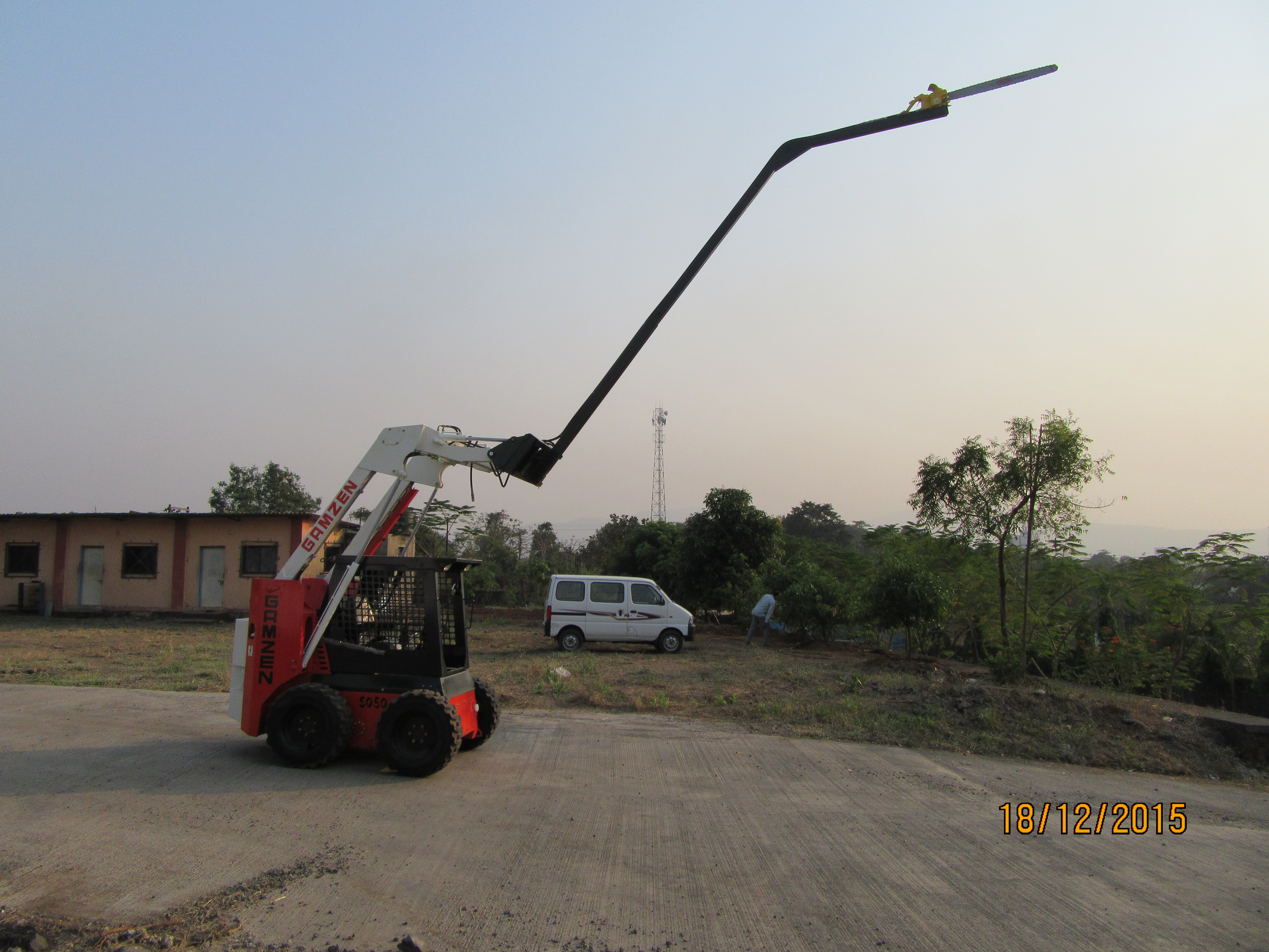 skid steer tree saw attachment